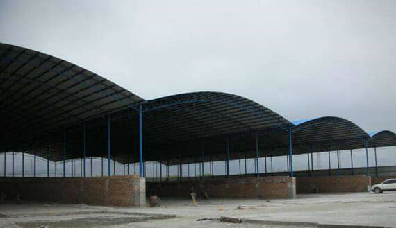 圆弧形彩钢材料料棚图