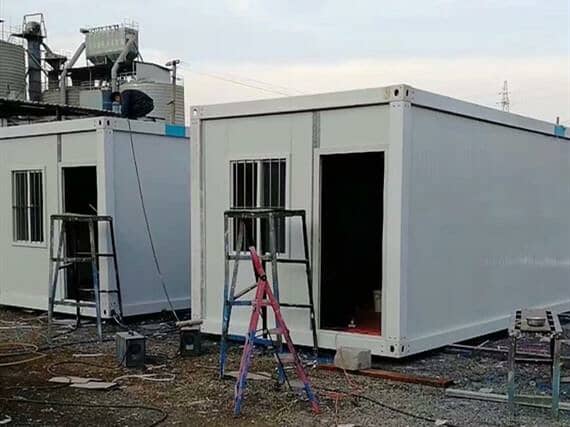 集装箱活动房里飘出《蜗居之歌》